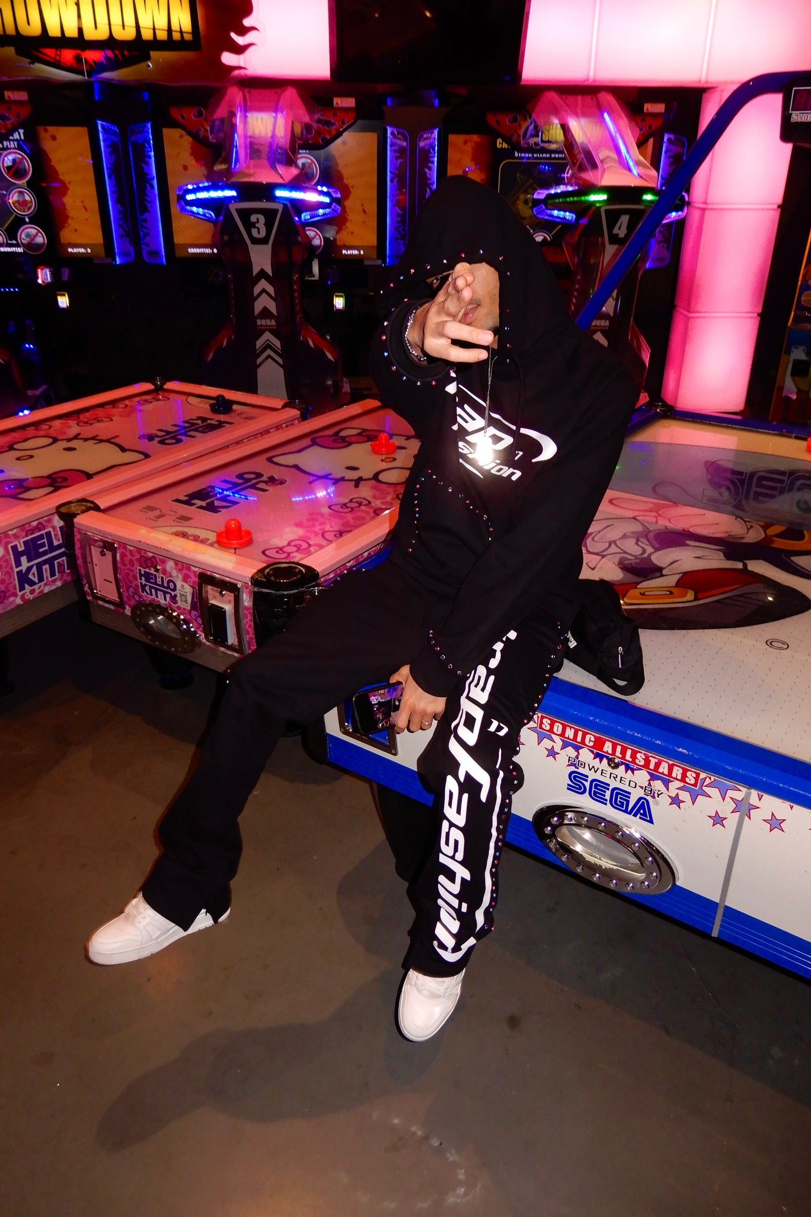 Model wearing oversized trapfashion seventeenthebrand diamond hoodie outside