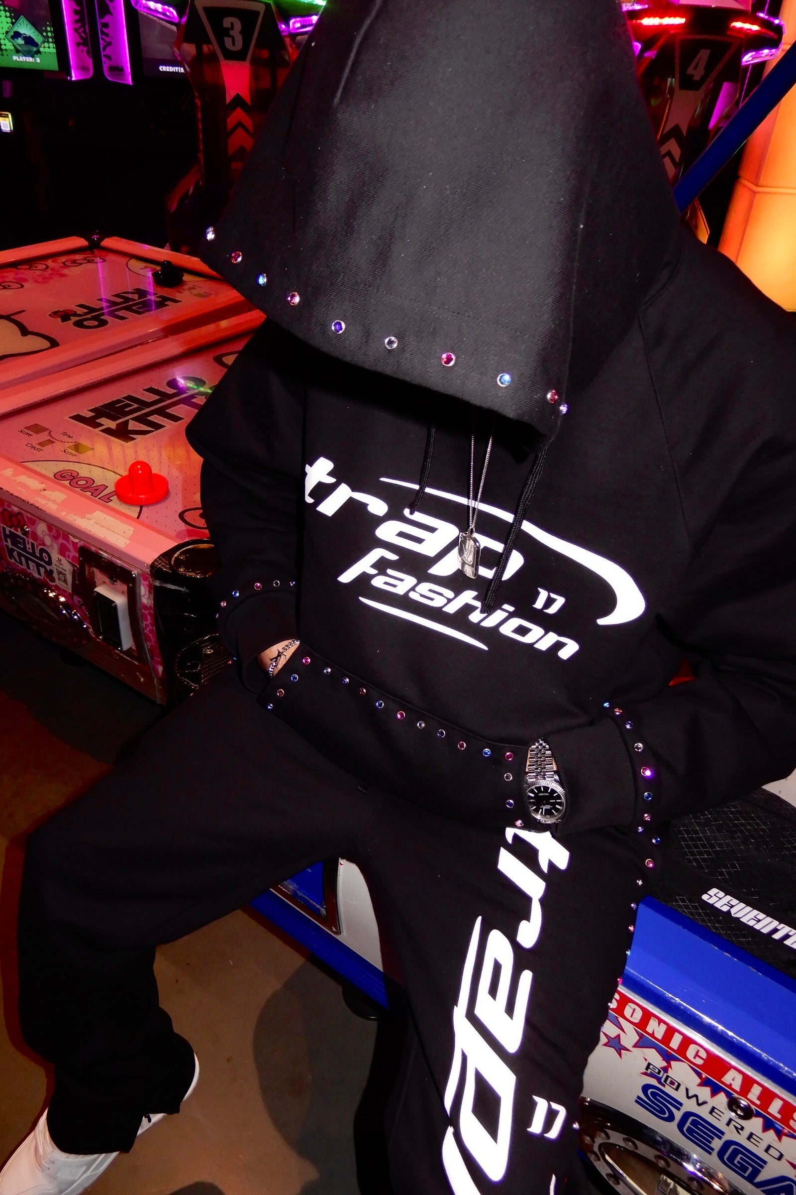 Model wearing oversized trapfashion seventeenthebrand diamond hoodie outside