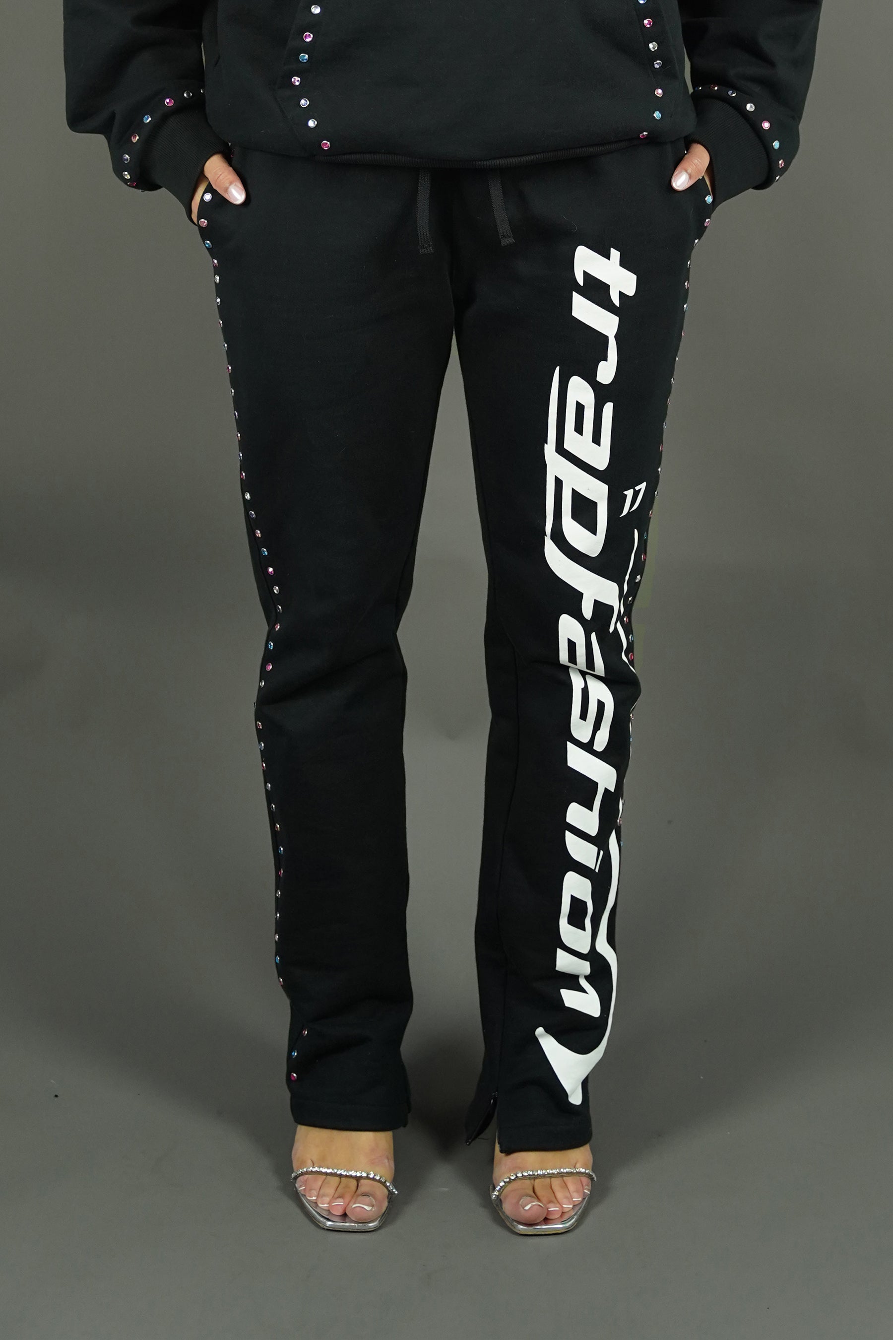front view of the diamond rhinestone studded pants of trapfashion seventeenthebrand