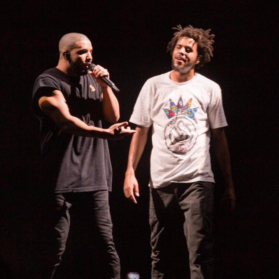 DRAKE BRINGS UP J. COLE TO THE STAGE TO TEASE THEIR COLLAB