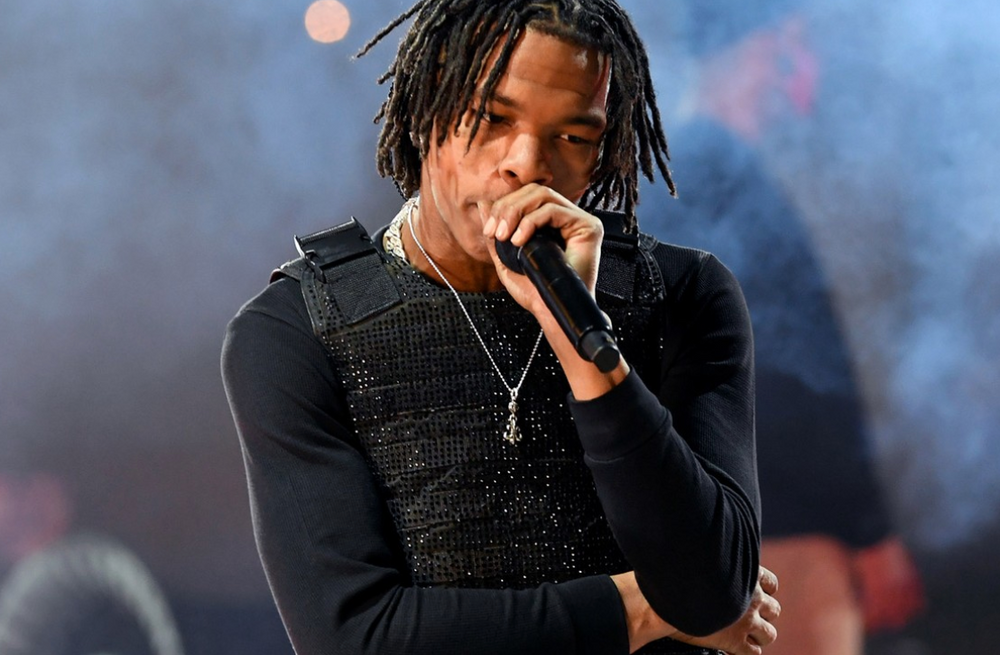Lil Baby Raps From the FIFA World Cup in "The World Is Yours To Take" Video