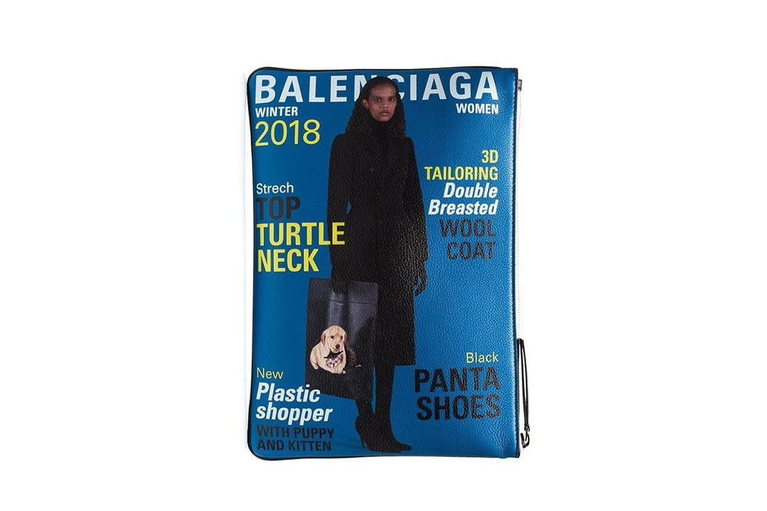 BALENCIAGA DROPS $715 USD MULTI-COLORED MAGAZINE PRINTED CLUTCH BAG