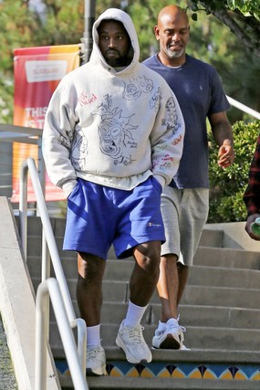 TAKE A BEHIND-THE-SCENES LOOK AT KANYE WEST’S CUSTOM ‘RICK AND MORTY’ HOODIE