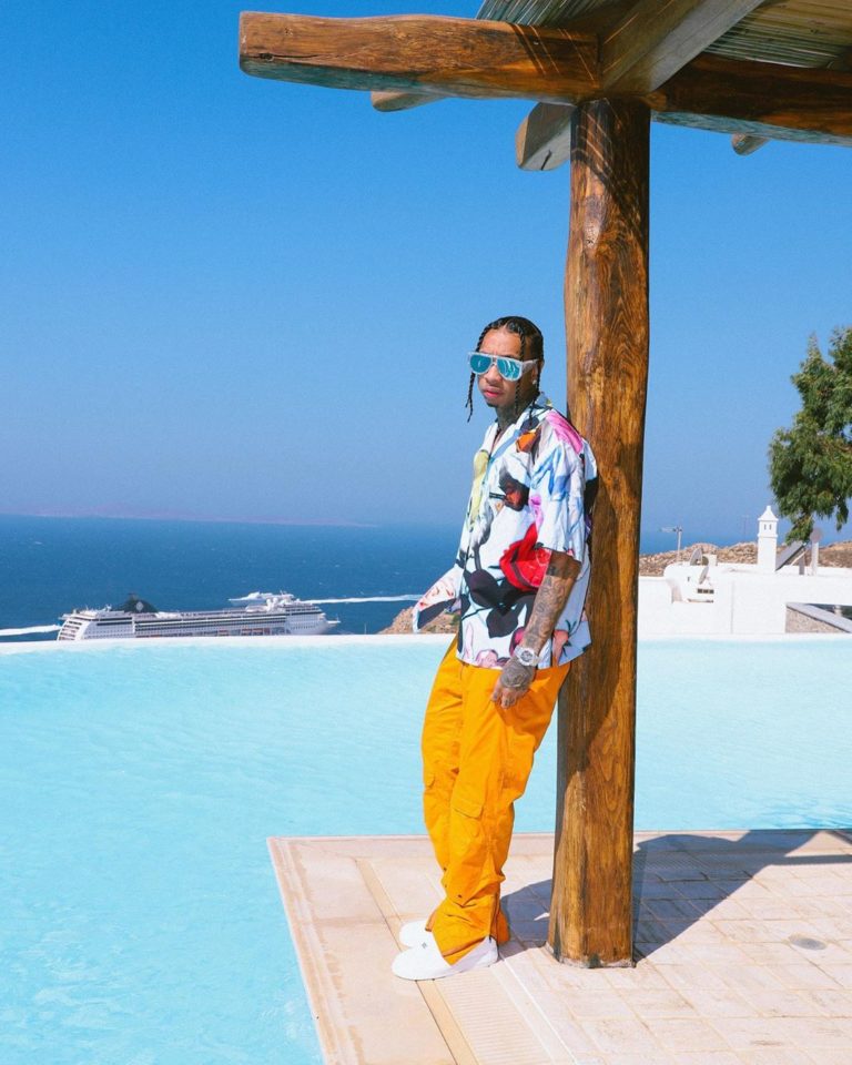 SPOTTED: TYGA DONS LOUIS VUITTON SUNGLASSES POOLSIDE IN MYKONOS