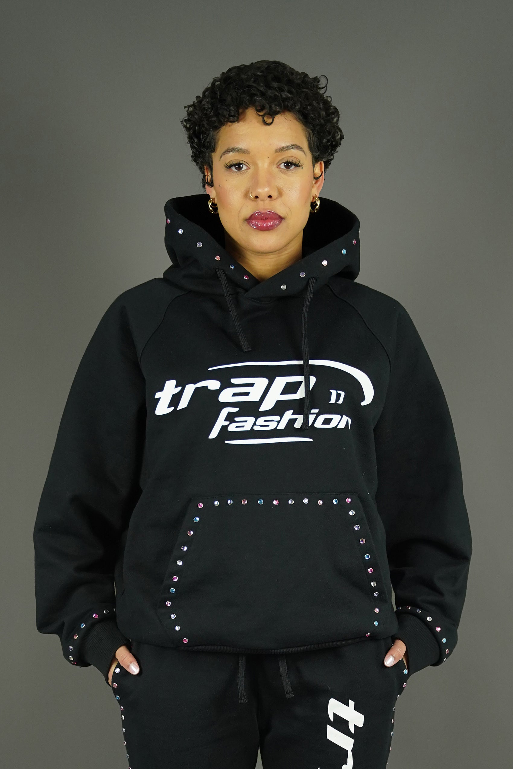 Front view of Trapfashion Diamond Hoodie, Model wearing oversized diamond hoodie