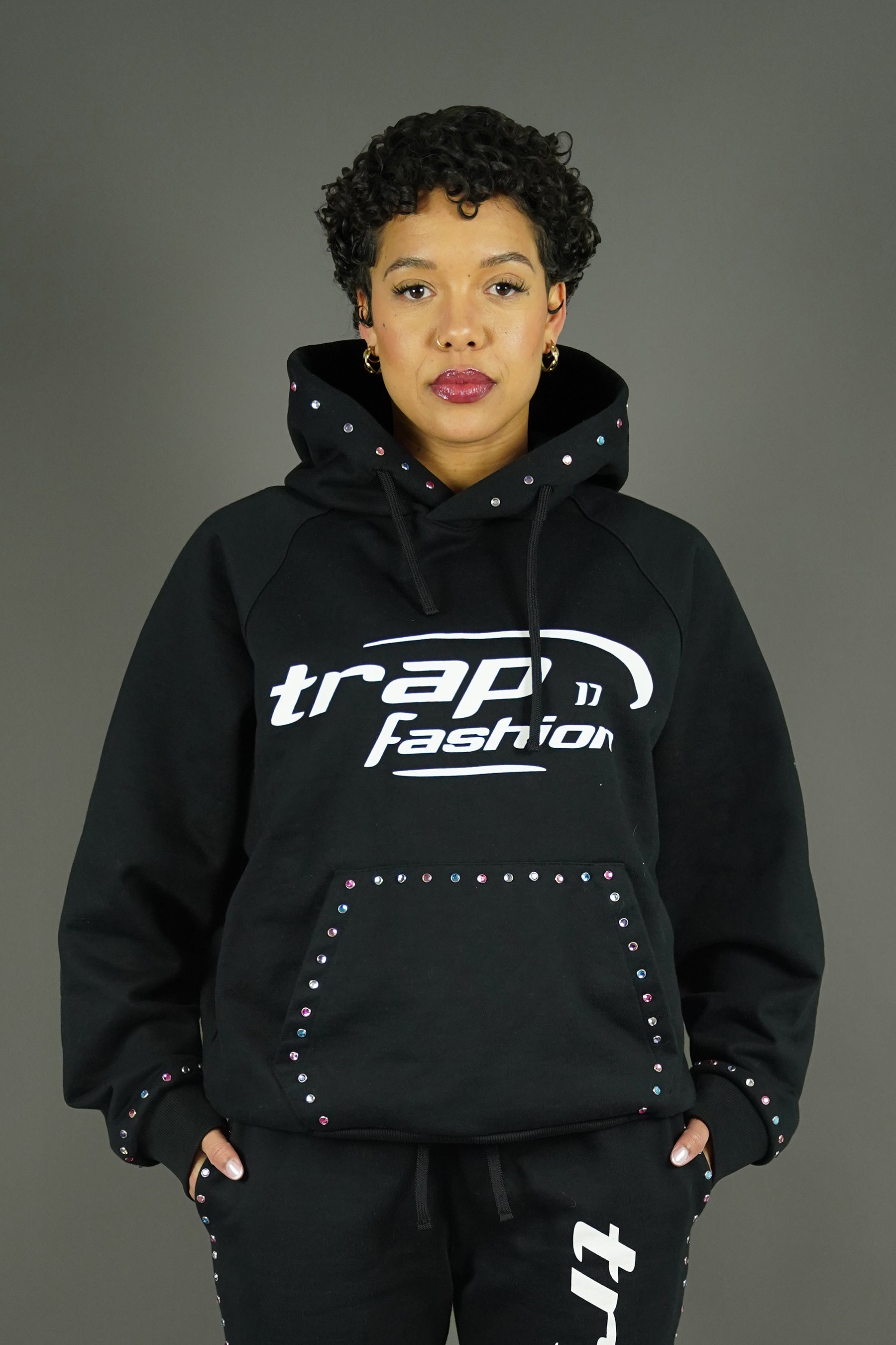Front view of Trapfashion Diamond Hoodie, Model wearing oversized diamond hoodie